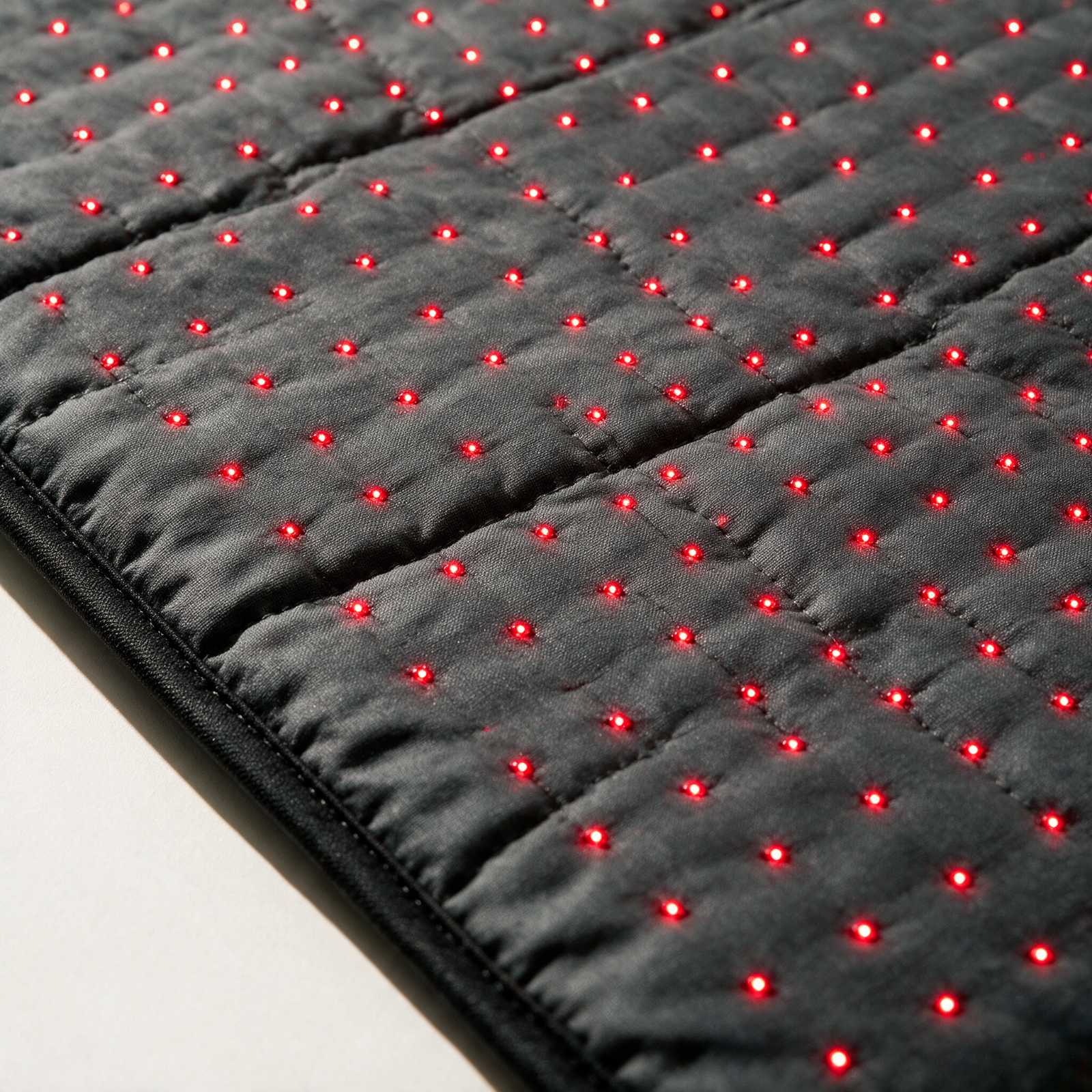 Macro detail of the Mat’s quilted LED surface